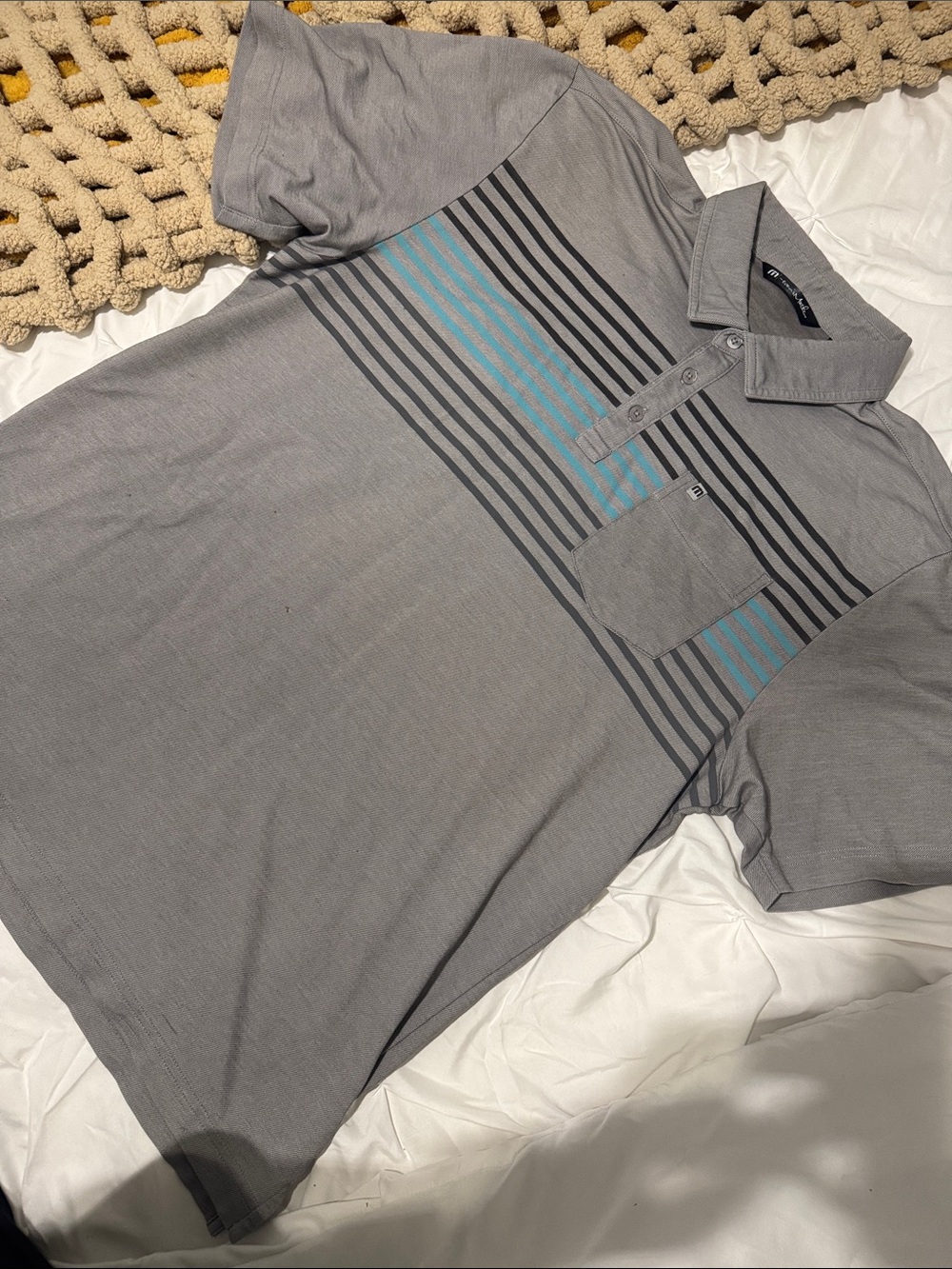 Travis Mathew Men's Gray Polo Shirt with Blue Stripe Accent